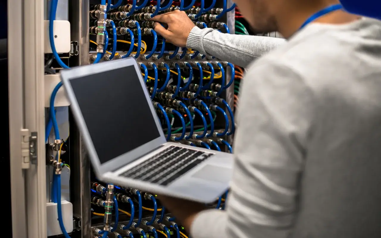 A technician troubleshooting issues with network connectivity on a computer screen